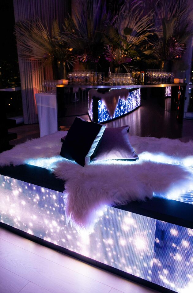 lounge seating at a party in a dark room.