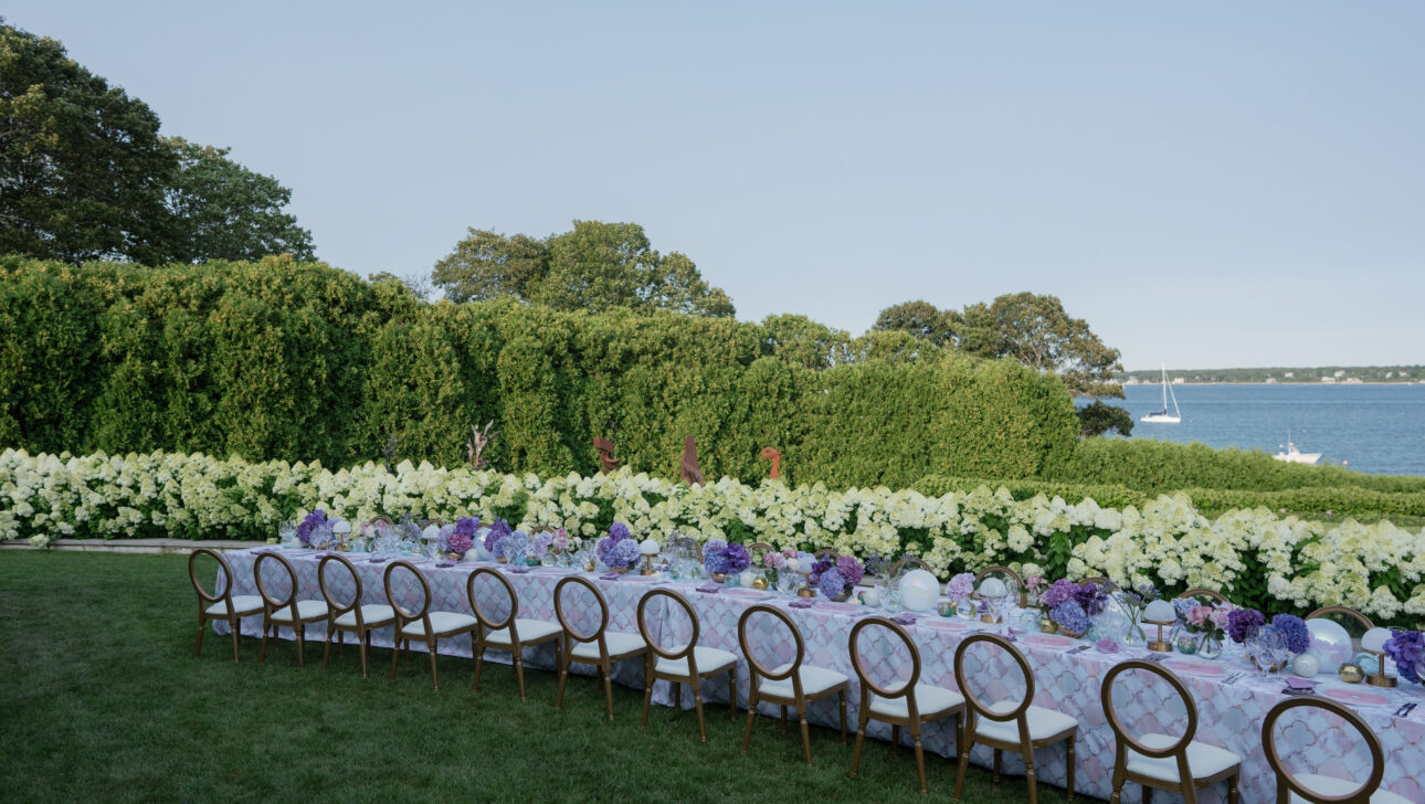 Oceanfront wedding reception dinner tablescape. Designed by  JWennes Events.