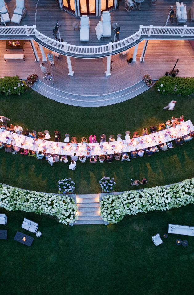 Martha's VIneyard wedding reception aerial shot of tablescape during dinner reception. Designed by  JWennes Events.